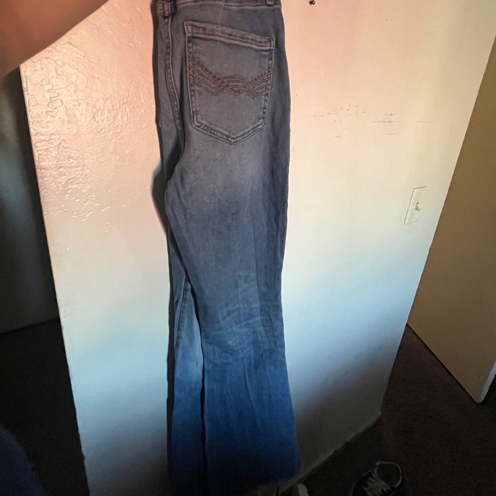 IDYLLWIND FLARED HIGH WASTED JEANS MEDIUM WASH